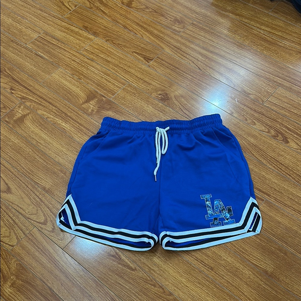 Blue Athletic Shorts with White Trim